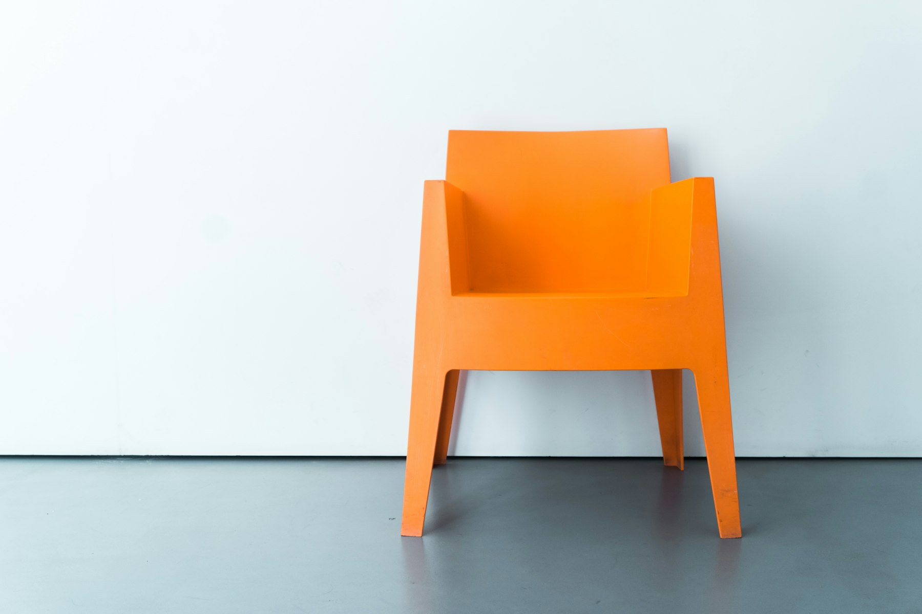 Ember armchair in signal orange